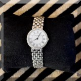 J05. Tiffany & Co. 14K white gold and diamond watch. 